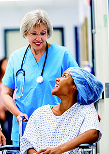 nurse with a patient in a wheelchair